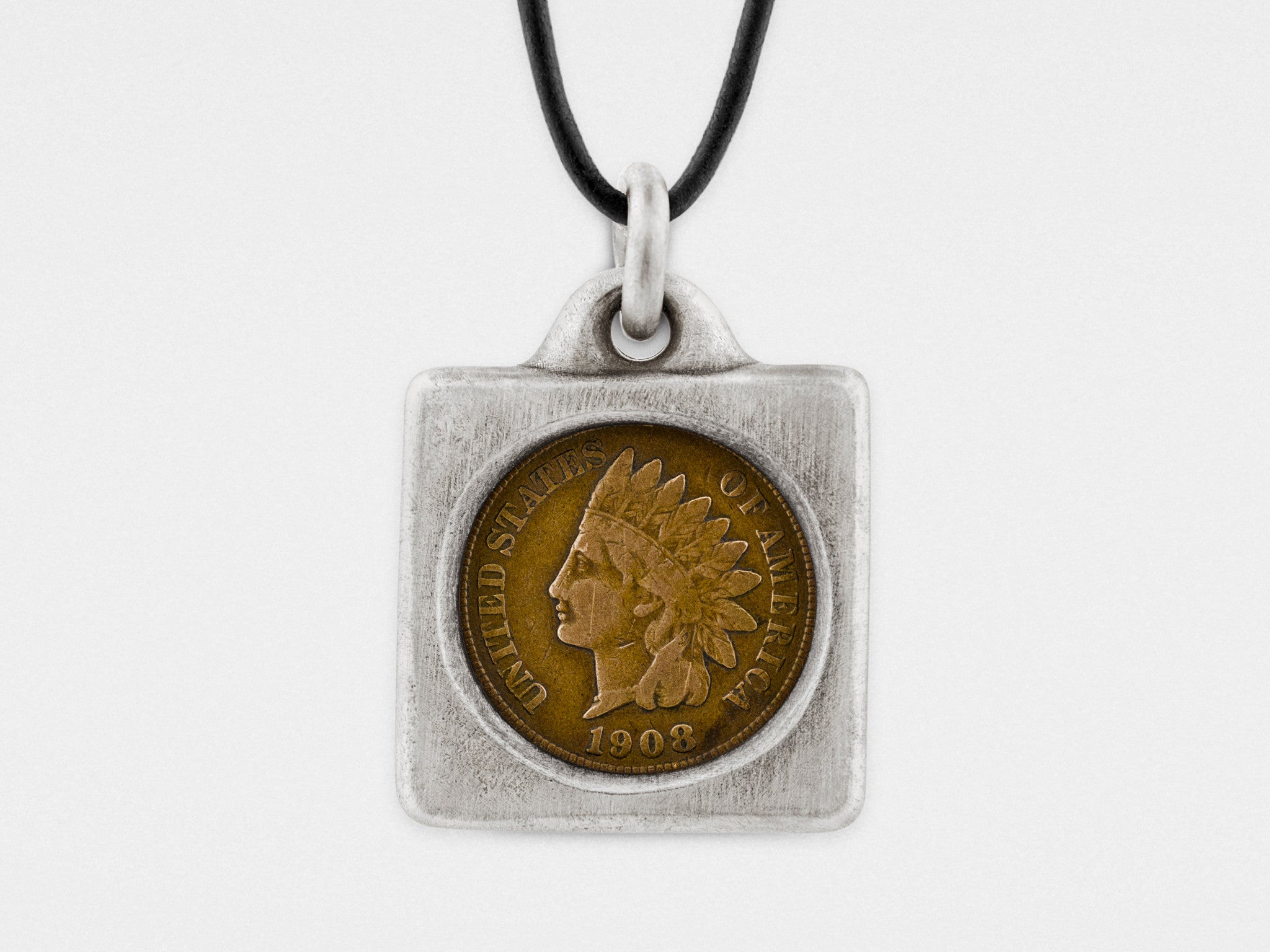 Orecchini a bottone con cuore intrecciato